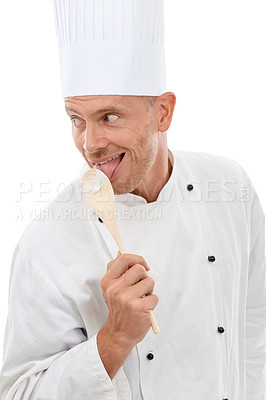 Buy stock photo Man licking spoon, chef uniform and goofy bakery owner and small business in restaurant industry isolated on white background. Happy cafe, discount deal and delicious menu special promotion in studio