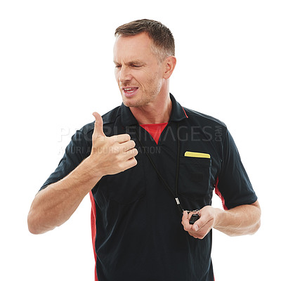 Buy stock photo Whistle, thumbs up and male referee in a studio giving instructions, direction or rules for a match. Sports, fitness and professional man coach with a approval gesture isolated by a white background.