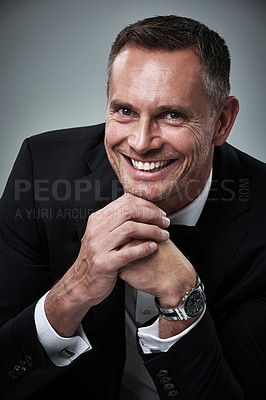 Buy stock photo Portrait of mature man, tuxedo and smile, handsome face and serious isolated on grey background in studio. Luxury, glamour and wealth, success and elegant celebrity actor or valentines day date.