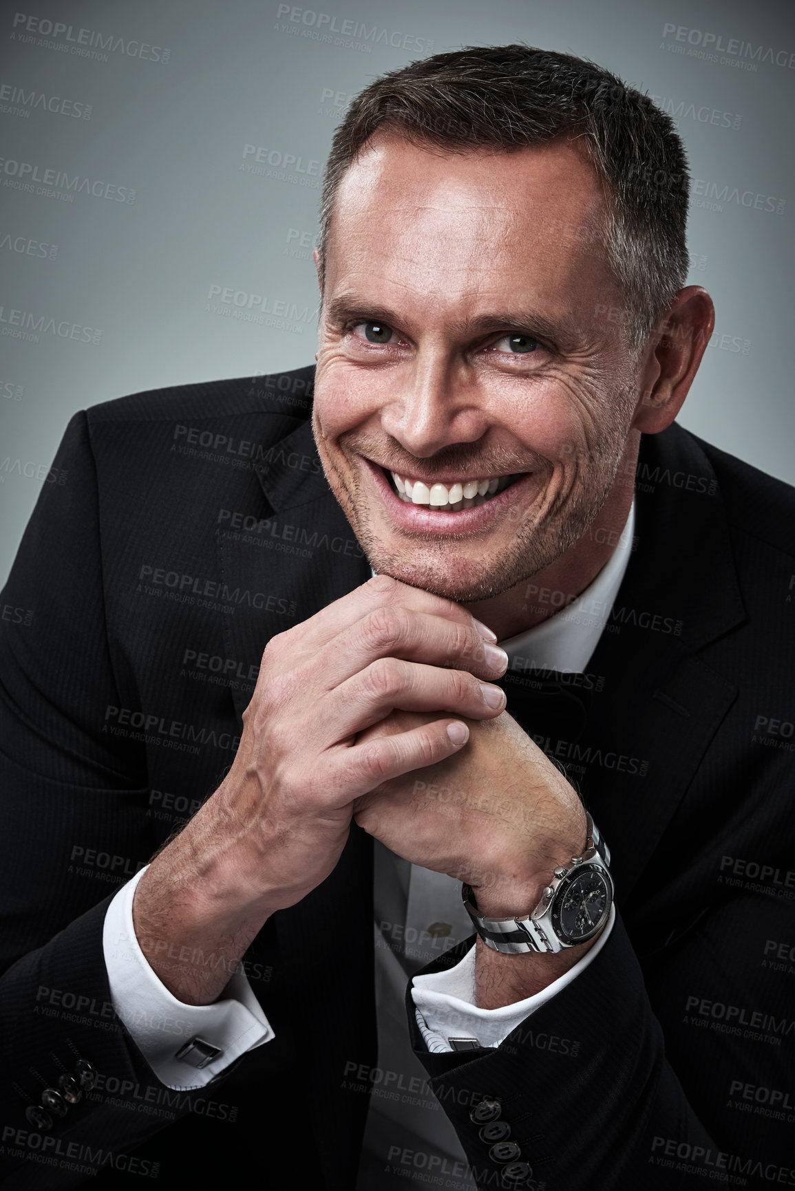 Buy stock photo Portrait of mature man, tuxedo and smile, handsome face and serious isolated on grey background in studio. Luxury, glamour and wealth, success and elegant celebrity actor or valentines day date.