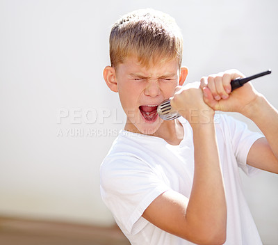 Buy stock photo Microphone, singer and voice of child in home for fantasy concert and mockup. Kid on mic, karaoke and music, song and recording sound, audio performance of musician on technology and creative talent
