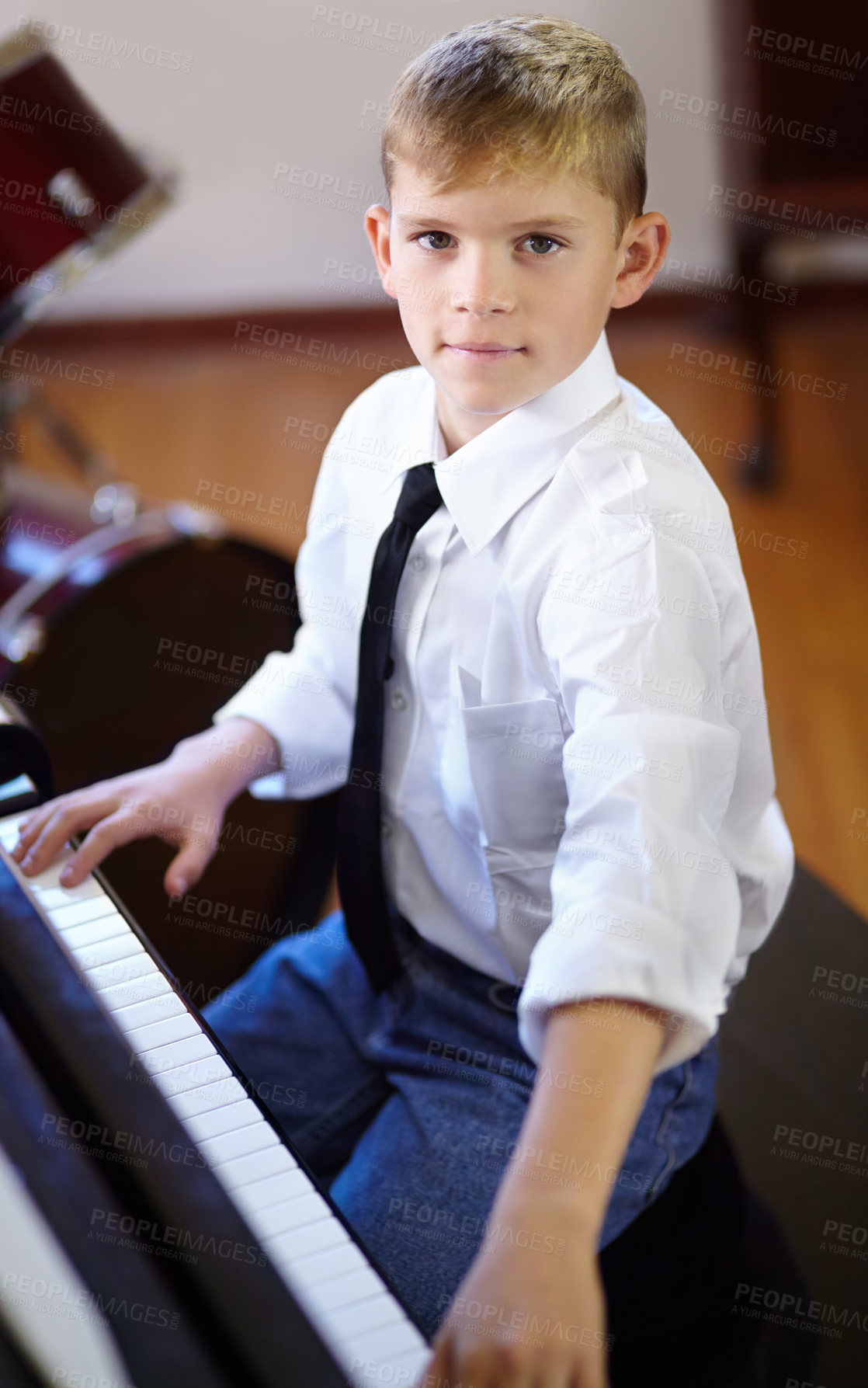Buy stock photo Child, piano and music for keyboard, serious and confident with attention, musician and band. Portrait, creative and passion with maestro, play or learning for musical, boy or practice concentration
