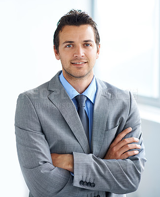 Buy stock photo Portrait, arms crossed and business man in company,  corporate office or workplace pride. Face, professional employee and confident lawyer in suit, attorney or consultant working at law firm in Spain
