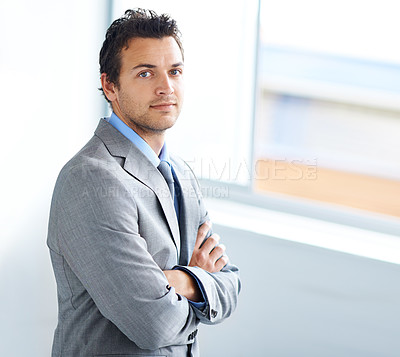 Buy stock photo Portrait, serious and business man with arms crossed in workplace, corporate office or company pride. Face, professional employee and confident lawyer in suit, attorney or consultant working in Spain