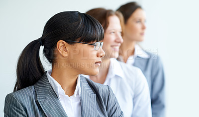 Buy stock photo Thinking, business people or group in row, planning future or strategy isolated in studio on a white background. Vision, team or professional in line, profile or leadership of lawyer in collaboration