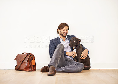 Buy stock photo Smile, love and happy businessman with pet for bonding together with positive and good attitude. Mockup, briefcase and professional male person playing with dog, puppy or animal on floor at home.