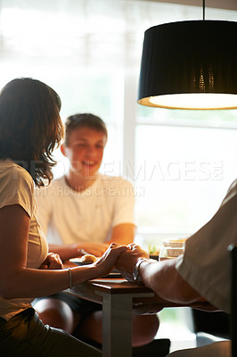 Buy stock photo Holding hands, prayer or family praying for food or support at a dinner table with child, dad or mom. Solidarity, God or spiritual people eating lunch with faith, hope or gratitude in Christian home 