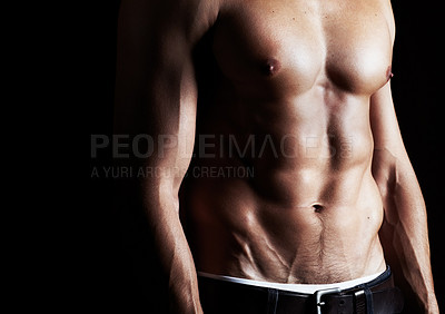 Buy stock photo Closeup, muscle and man with fitness, sexy and bodybuilding on a dark studio background. Healthy person, model and guy with abs, stomach or exercise with workout, wellness and health with aesthetic
