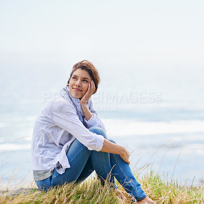 Buy stock photo Woman, thinking and relax at beach in nature with happiness, gratitude and peace on holiday or vacation. Mindfulness, mock up and person on hill at the ocean or sea with ideas for future or travel