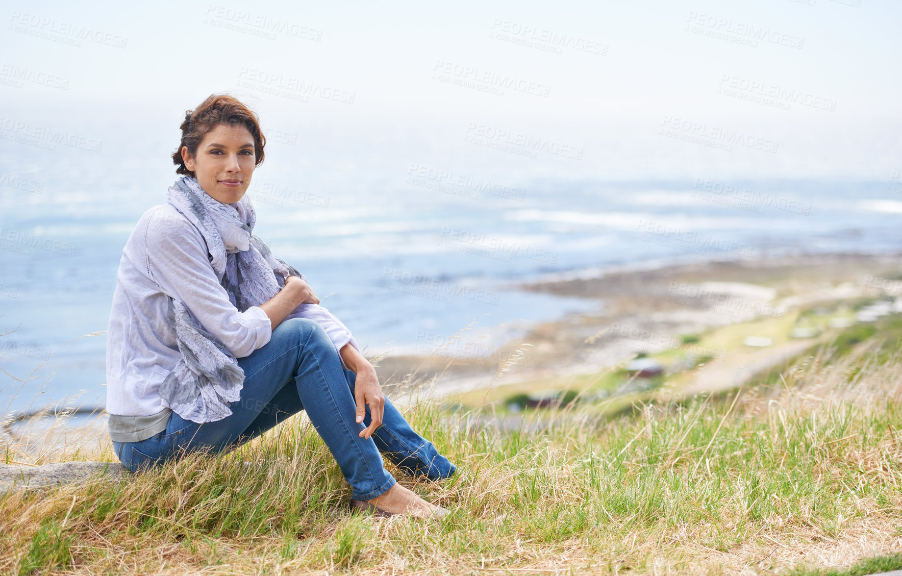 Buy stock photo Mature, woman and relax in nature with portrait in landscape with gratitude and peace on holiday or vacation. Retirement, mock up and person on a hill at the beach, ocean or sea with ideas for future