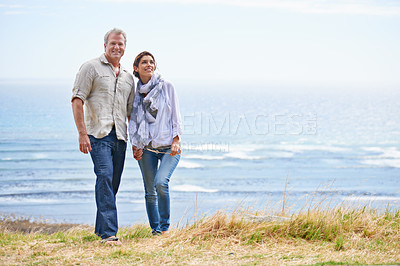 Buy stock photo Couple, portrait and holiday at beach with sea, ocean or walk on blue sky in summer. Happy, man and woman with support, love and care together or travel on adventure with freedom in marriage