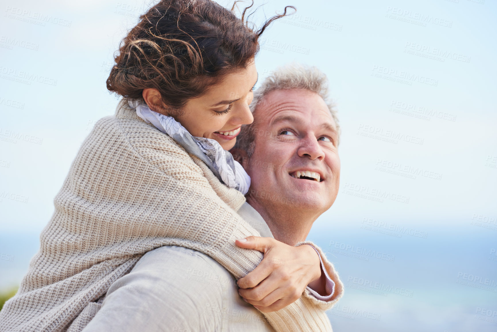 Buy stock photo Mature couple, happy and outdoor on vacation, travelling and weekend for enjoying holiday. Man, woman and bonding together with smile, marriage and commitment with affection, blue skies and joyful
