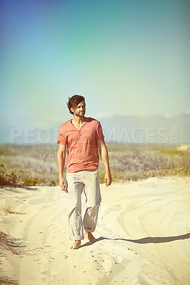 Buy stock photo Man, walking and mountains with casual for journey, travel and vacation with grass and nature. Male person, hiking and sand road barefoot in Ukraine desert for explore, trip and holiday from war