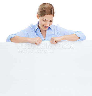 Buy stock photo News, woman behind blank sign and mockup with product placement isolated on white background. Advertising, marketing and portrait of happy woman looking down at poster board announcement and smile.