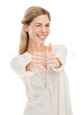 Buy stock photo Portrait, wink and happy woman with thumbs up in studio for support, trust or winning gesture on white background. Face, smile and female model with hand emoji for success, thank you or motivation