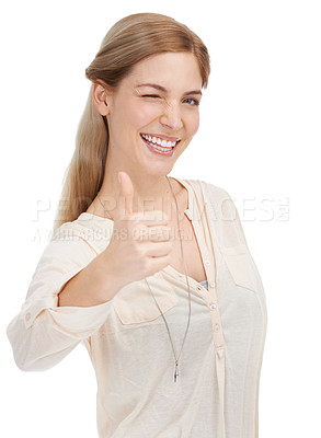 Buy stock photo Portrait, happy woman and wink with thumbs up in studio for support, trust or winning gesture on white background. Face, smile and female model with hand emoji for success, thank you or motivation