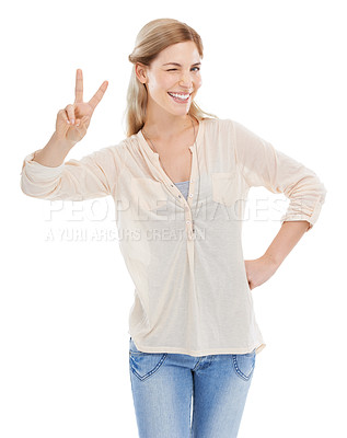 Buy stock photo Smile, peace sign and woman wink in portrait at studio isolated on a white background. Girl blink, fingers and v hand gesture, emoji and young female model with symbol for victory, success or winning