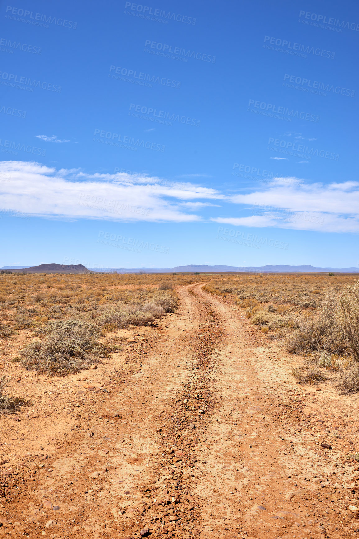Buy stock photo Landscape of arid, barren highland in Savanna Desert in rural South Africa with copyspace. Dry, empty, vacant, remote land against blue sky. Global warming and climate change in drought environment