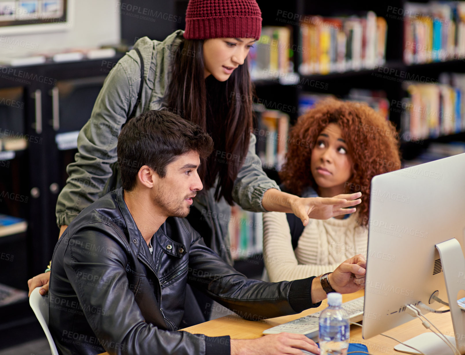 Buy stock photo University, discussion and students research for project, test or assignment in library on campus. Scholarship, knowledge and friends learning in college computer class for technology and information