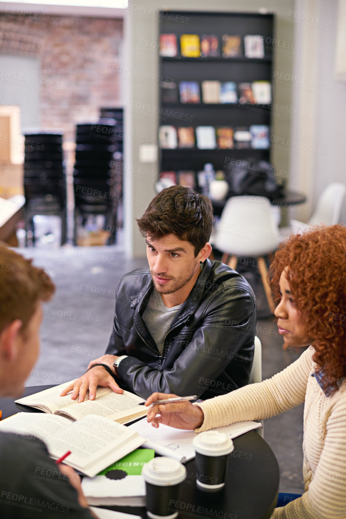 Buy stock photo Students studying in a group in library on campus, people learning for university education and scholarship. Academic development, knowledge with men and woman, study with books for research 