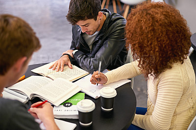 Buy stock photo Students studying in a group in library, people learning for university education and scholarship. Academic development, knowledge with young men and woman study for exam, research and writing notes