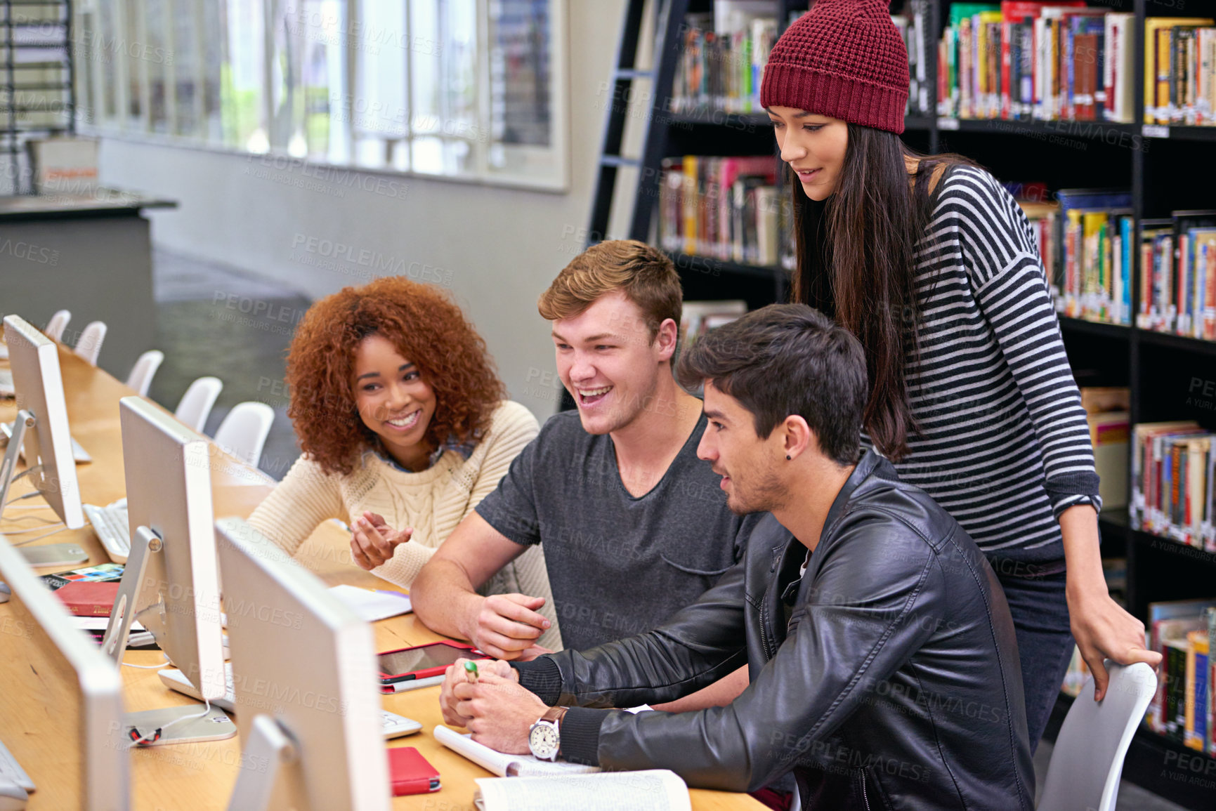 Buy stock photo Education, library and happy group of students on computer for exam, learning knowledge and friends research. University, desktop and team of people studying together, discussion or laugh in college