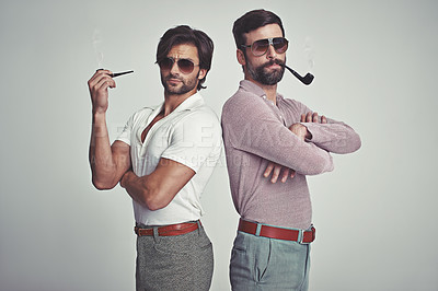Buy stock photo Fashion, men and sunglasses or pipe in studio with vintage model, hipster outfit and confidence with arms crossed. Friends, people and attitude with 70s style or retro clothes with white background