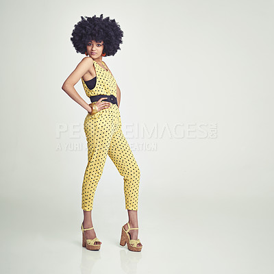Buy stock photo Studio shot of a young woman wearing a jumpsuit