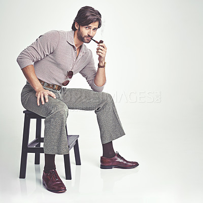 Buy stock photo Vintage, man and portrait or smoking in studio with retro fashion, hipster outfit and confidence on chair. Model, person and face with 70s style, mock up space and calm expression on white background