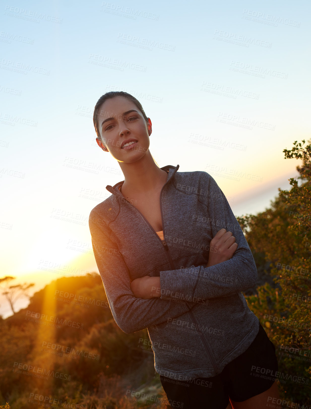 Buy stock photo Fitness, woman and portrait in nature with confidence, wellness and ready for exercise with sky space. Girl, trail runner and arms crossed in park for challenge, healthy body and lose weight progress