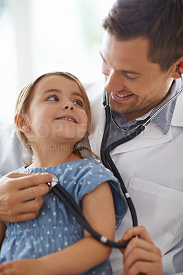 Buy stock photo Child, doctor and stethoscope of pediatrician for healthcare consulting, check lungs and listening to heartbeat. Happy girl kid, man and chest for clinic consultation, medical analysis and assessment