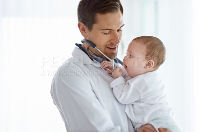 Buy stock photo Man, pediatrician and baby playing with stethoscope for medical assessment, support or healthcare of children. Cute newborn, doctor and pediatrics in clinic, kids hospital and trust of expert mockup