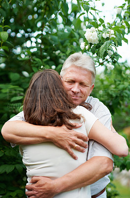 Buy stock photo Senior man, hugging or wife in park for care or love romantic for commitment in marriage. Celebration, happy couple and wellness in nature to connect, bond and together in support partner on vacation