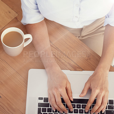 Buy stock photo Hands, business person and coffee at laptop for typing email, planning online research and editing from above. Closeup, mug of tea and employee working on computer keyboard for digital administration