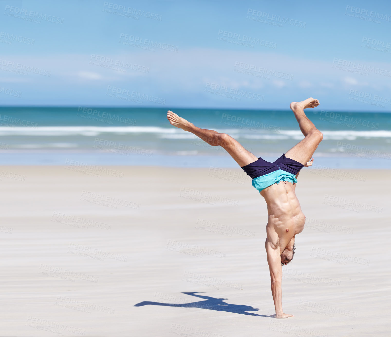 Buy stock photo Man, calisthenics and body at sea for exercise with summer, health and wellness. Male athlete, ocean water and activity for sports training with sunshine, strong muscles and hand at Cape Town beach