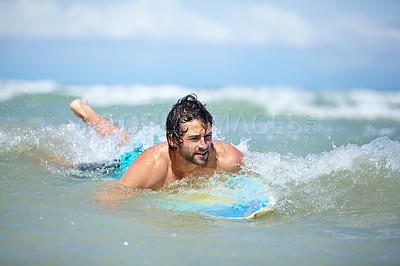 Buy stock photo Man, surfing and sea swimming with workout, training and waves with water sport and exercise outdoor of athlete. Surfer, freedom and vacation by the ocean and beach for summer wellness and fitness