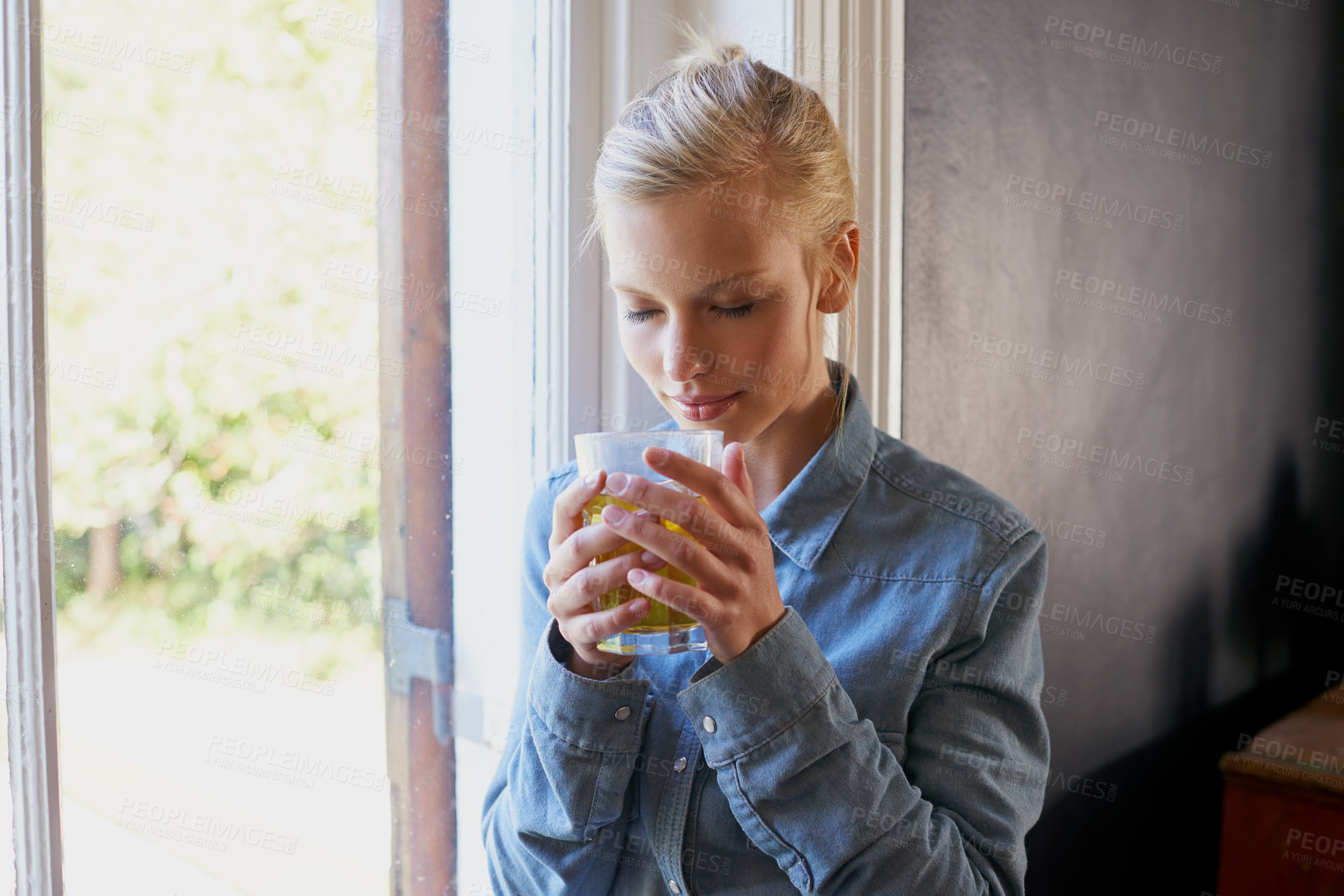 Buy stock photo Relax, smelling and woman with coffee in a house for morning drink, caffeine or comfort beverage in her home. Tea, aroma and female person chilling in a living room of day off, weekend or vacation 