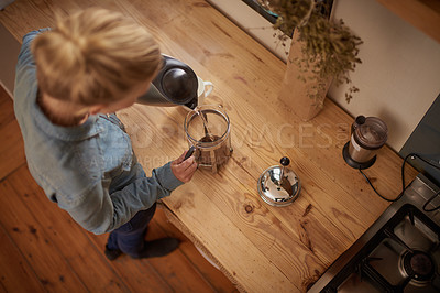 Buy stock photo Woman, coffee and french press with kettle in kitchen for morning beverage, hot water or preparation. Female person, plunger and counter from above in apartment for caffeine drink, espresso or peace