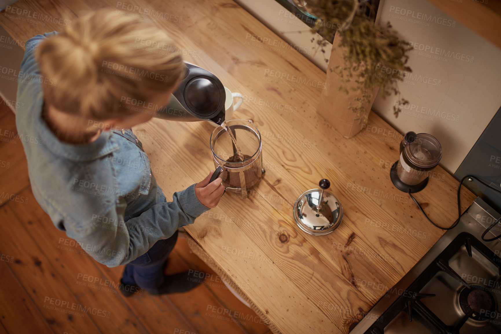 Buy stock photo Woman, coffee and french press with kettle in kitchen for morning beverage, hot water or preparation. Female person, plunger and counter from above in apartment for caffeine drink, espresso or peace