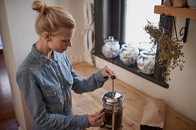 Buy stock photo Woman, coffee and french press in kitchen for breakfast beverage in morning for relax, weekend or holiday. Female person, caffeine and plunger on counter for cappuccino drink, latte or preparation