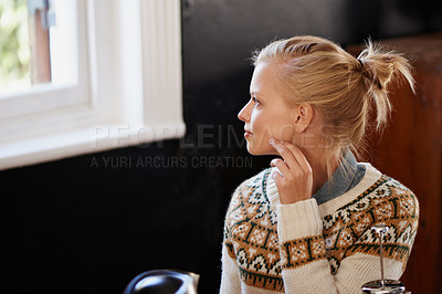 Buy stock photo Woman, thinking and kitchen window with coffee in winter or wondering in morning for future, decision or planning. Female person, thoughts and cozy in living room for nature view, memory or relax