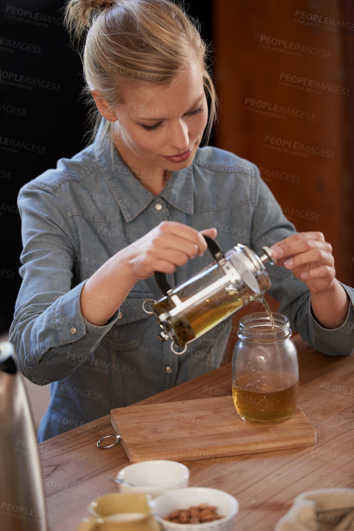 Buy stock photo Woman, smile and tea of herbs in home and warm beverage of herbal mixture for health wellness. House, herbalist and detox with dry leaves in plunger and chamomile drink to relax in kitchen in above