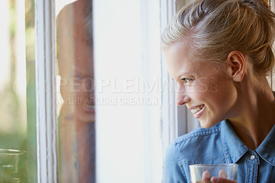 Buy stock photo Thinking, smile and woman with coffee in a house for peaceful, reflection or moment at home. Remember, face and female person with happy memory, tea or enjoying me time or weekend at apartment window