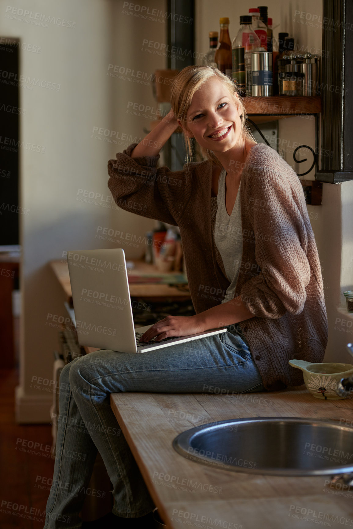 Buy stock photo Woman, kitchen and laptop with smile, portrait and for learning, internet or email. Happy influencer, technology and research for blog, payment or registration for planning, working or accounting