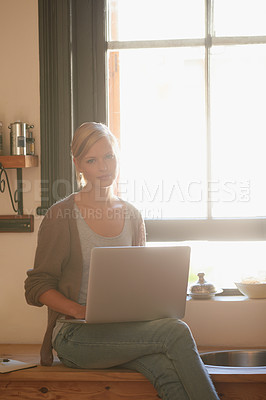 Buy stock photo Woman, kitchen and laptop with window, portrait and computer for connection and internet. Copywriter, technology and research for blog, freelance and remote content for planning or working from home