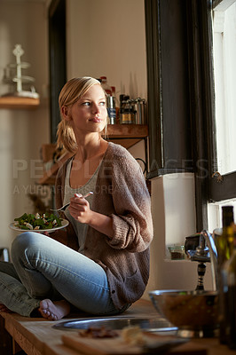 Buy stock photo Woman, kitchen and nutrition with smile, lunch and home for salad, vegetables and diet. Designer, house and break for health, wellness and relaxation and break for wellbeing, rest and happiness