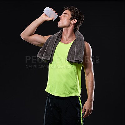 Buy stock photo Fitness, man and drinking water in studio with towel for sweat, workout and hydrate for wellness. Exercise, health and athlete by black background for muscles and liquid for weight loss or body care 