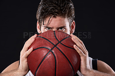 Buy stock photo Fitness, basketball and portrait of man in studio with practicing, workout or training for game. Activity, career and male athlete with sport equipment for match exercise isolated by black background