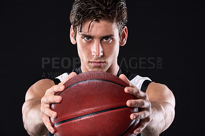 Buy stock photo Fitness, serious and man basketball player in studio with practicing, workout or training for game. Activity, portrait and athlete with sport equipment for match exercise isolated by black background