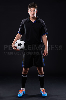 Buy stock photo Portrait of a handsome soccer playing holding a ball